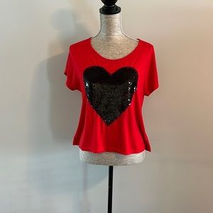 Wet Seal size Small short sleeve t- shirt with sequins black heart.